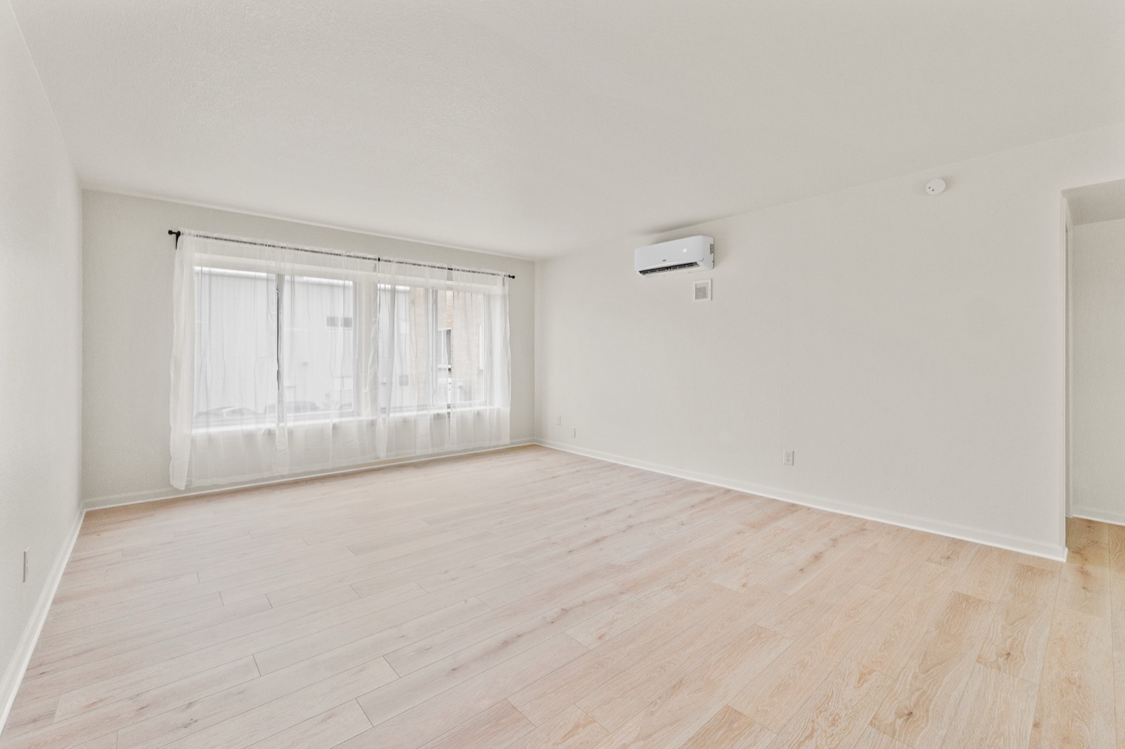 Bedroom with closet and AC
