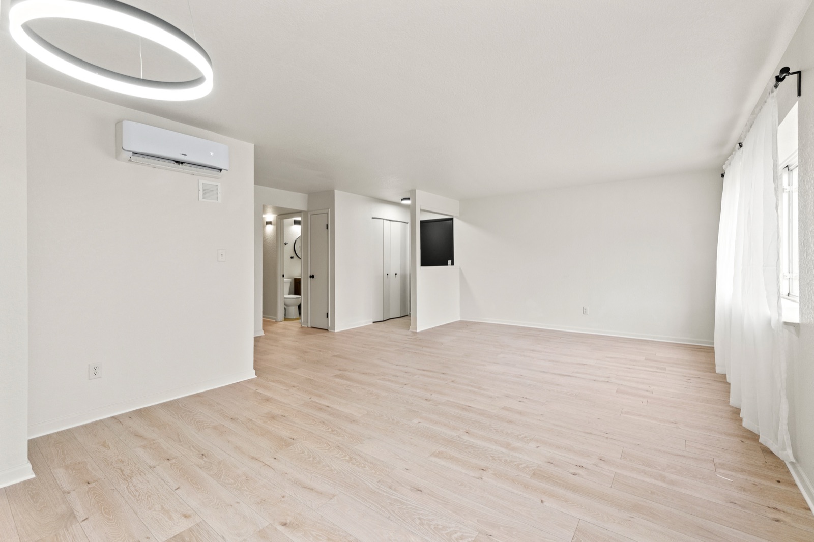 Living room with ring pendant light